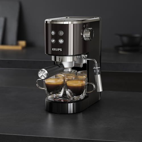 Machine à expresso Krups Virtuoso Essential - 15 bars. Acier inoxydable noir. Design compact et élégant. Arrêt automatique. Expresso et cappuccino. Thermobloc. Buse vapeur. Doseur inclus. XP4418