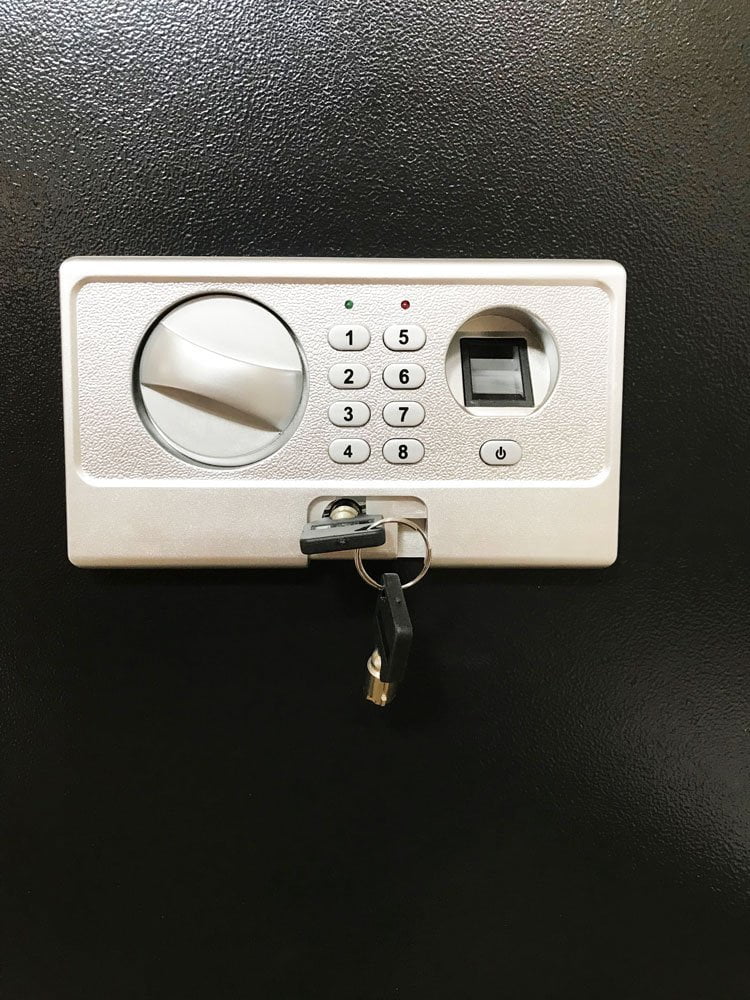 Indbygget elektronisk pengeskab med fingeraftryksadgang – integreret og skjult. Velegnet til håndvåben og kontanter.