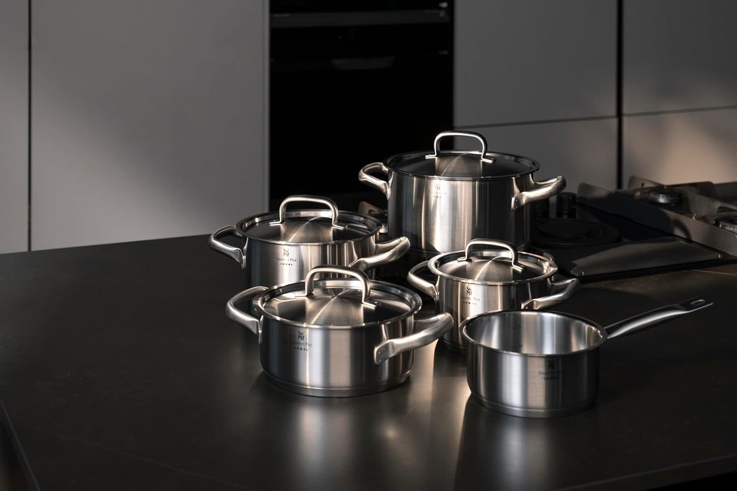 WMF Gourmet Plus - 5-teiliges Kochgeschirr-Set, Edelstahl, induktionsgeeignet, 1 flacher Bräter (20 cm), 3 hohe Bräter (16 cm, 20 cm und 24 cm), 1 Stielkasserolle (16 cm) mit 4 Edelstahldeckeln