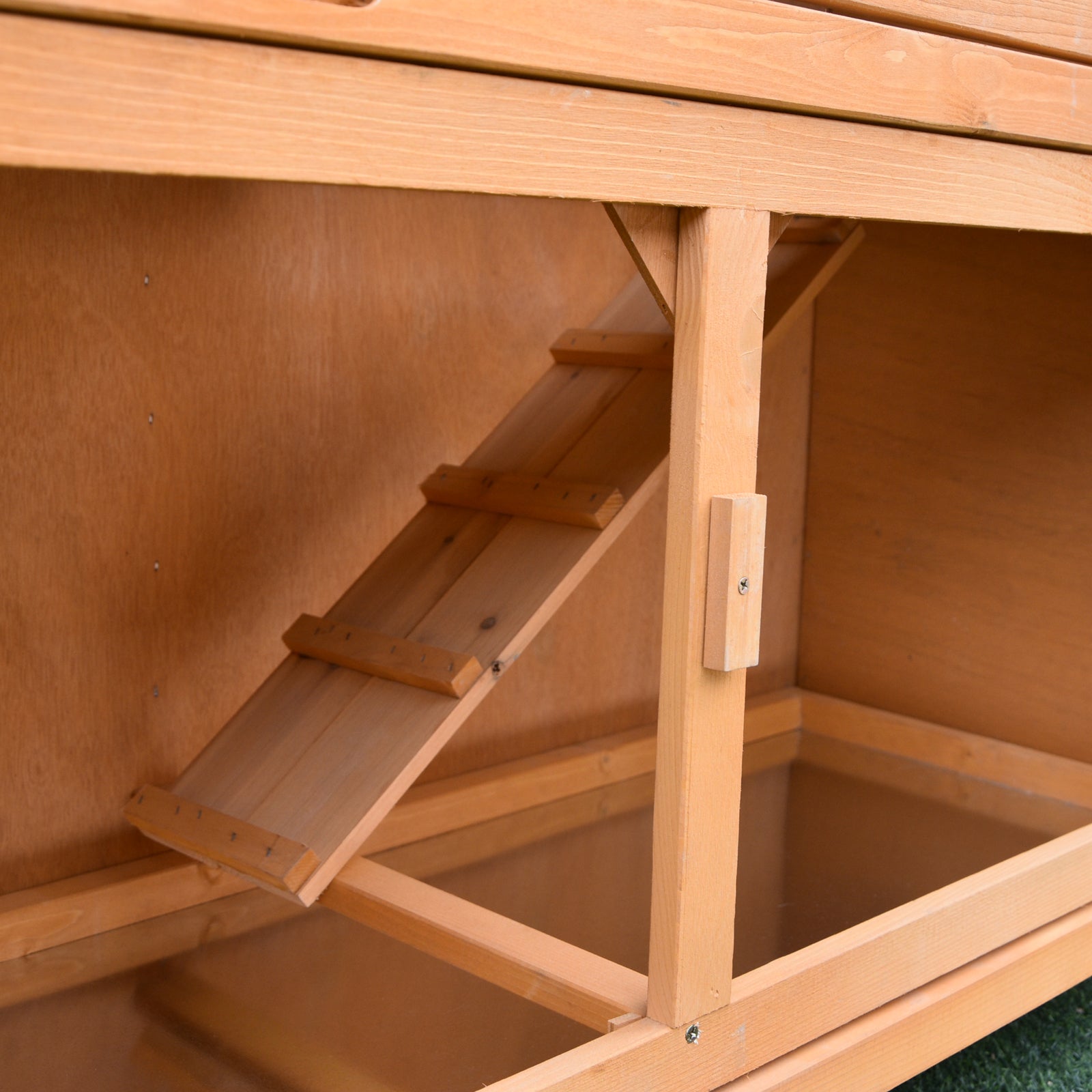 Cage à lapins PawHut en bois massif avec deux grands compartiments. Jaune