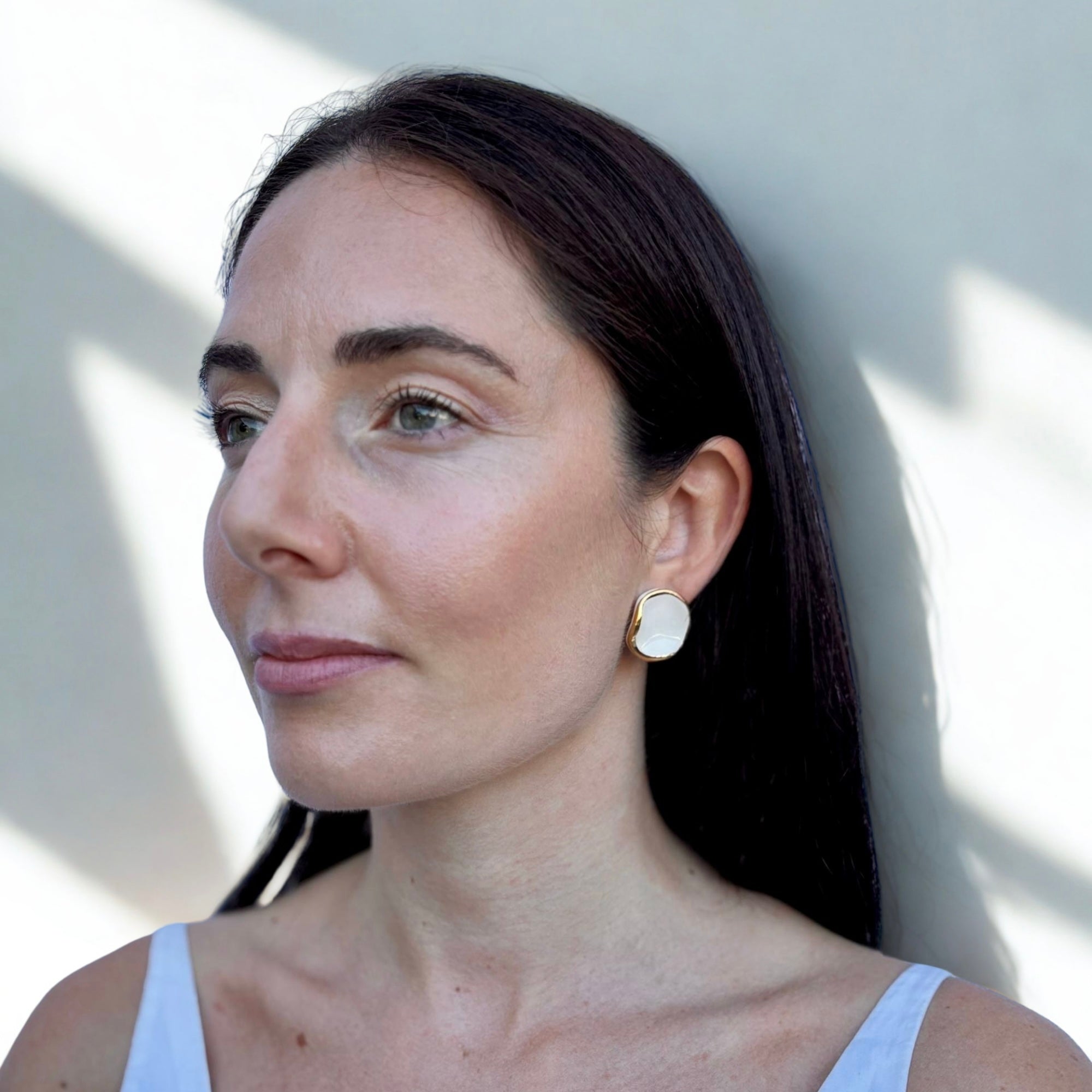 Leda | Handcrafted white ceramic stud earrings with gold luster