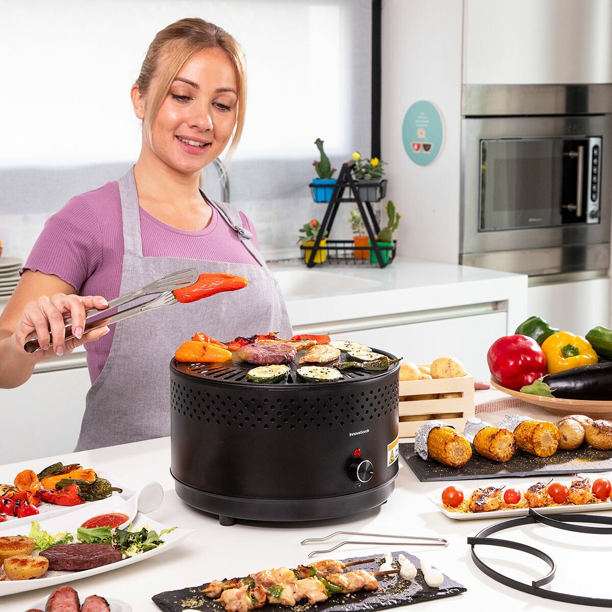 Innovagoods Tragbarer, rauchfreier Holzkohlegrill, Eisen, Ø 28,5 x 18 cm, Schwarz