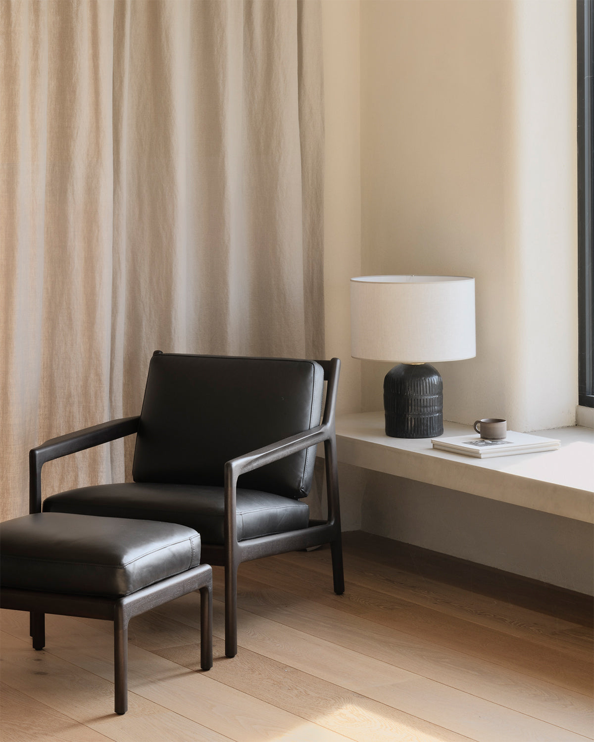 Reposapiés Jack - Cuero negro