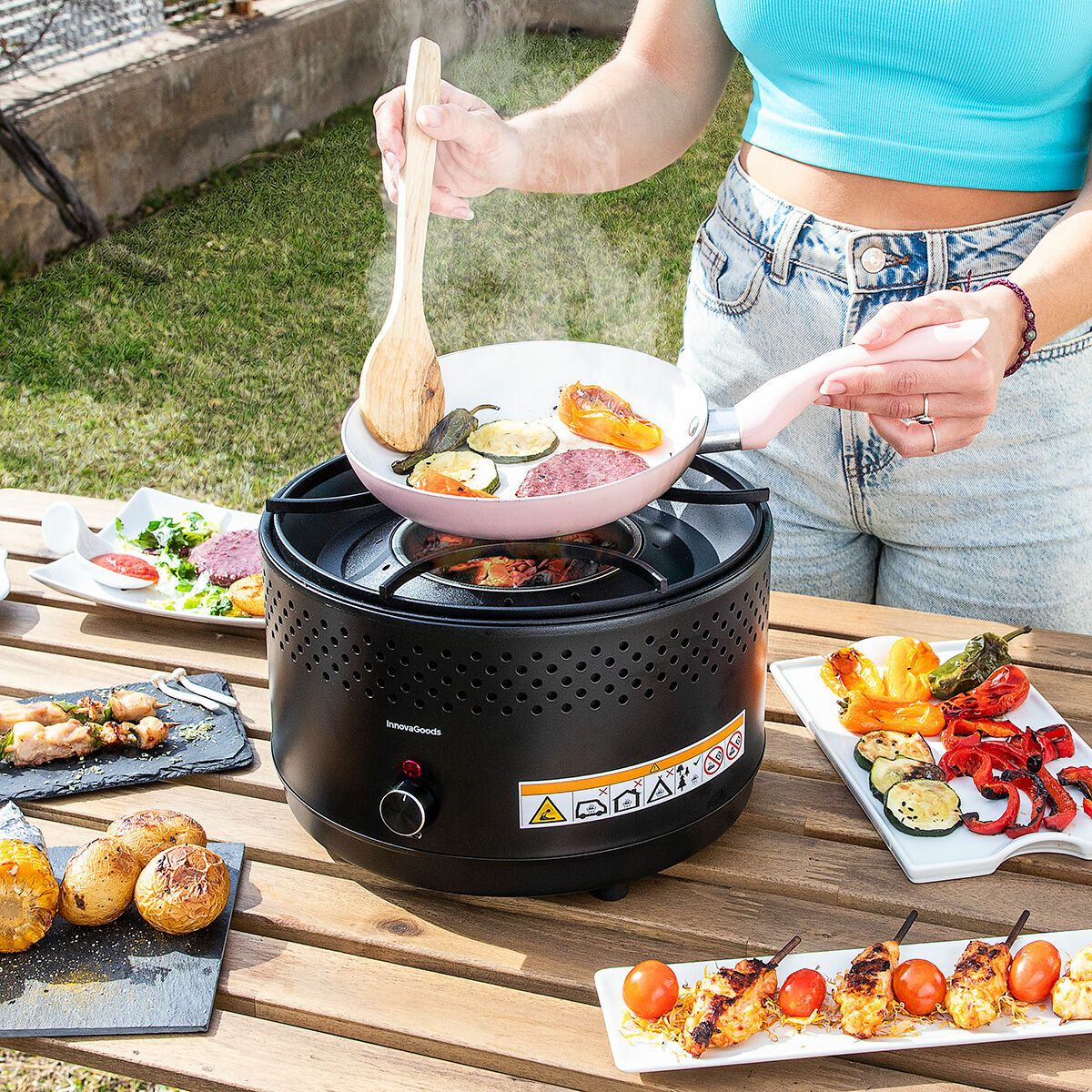Innovagoods Tragbarer, rauchfreier Holzkohlegrill, Eisen, Ø 28,5 x 18 cm, Schwarz