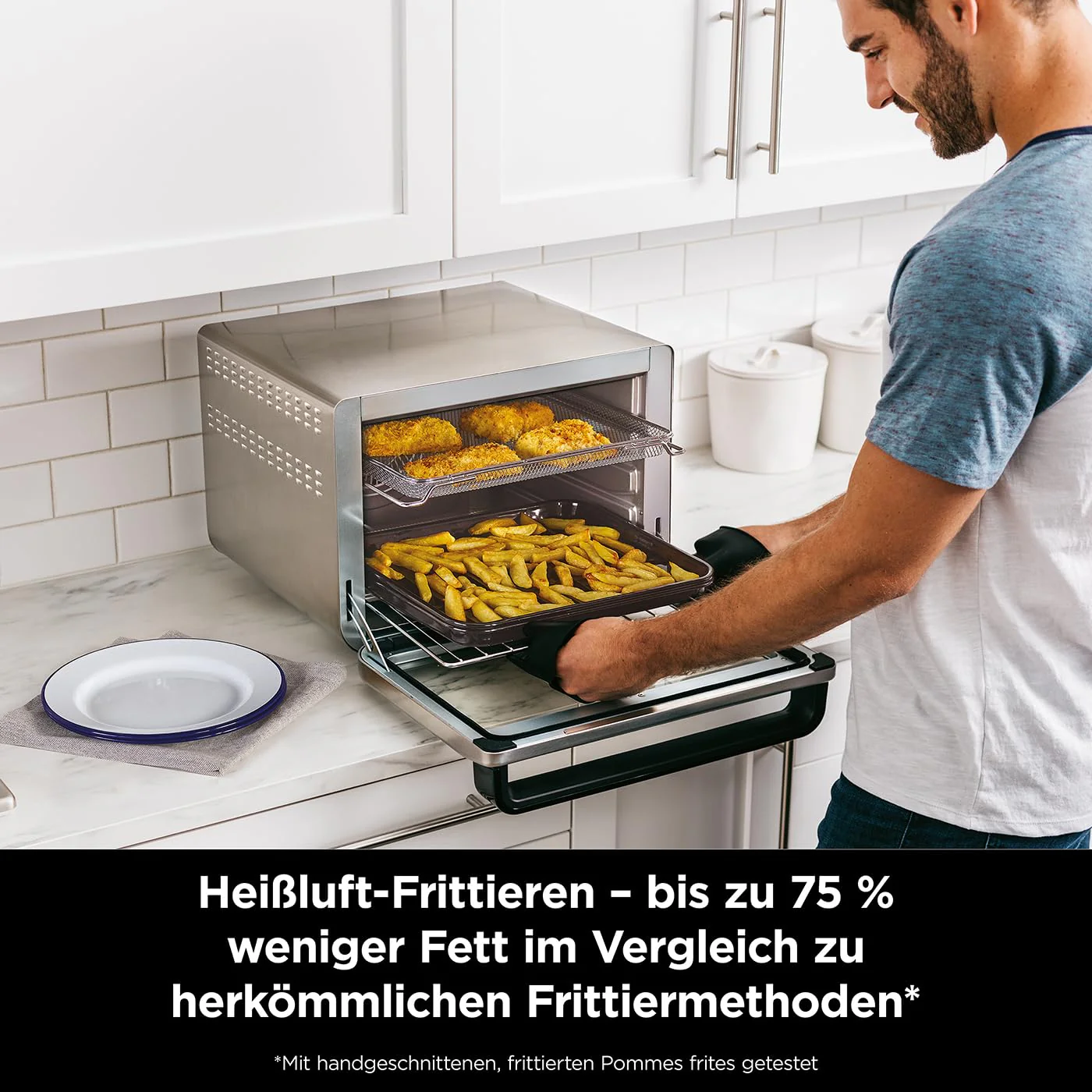 Ninja Foodi 10-in-1 Multifunktionsbackofen (Modelljahr 2025). Tragbarer Mini-Tischbackofen. Vielseitiger Backofen mit 10 Kochfunktionen: Heißluftfrittieren, Braten, Grillen, Backen und mehr. Silber/Schwarz DT200EU